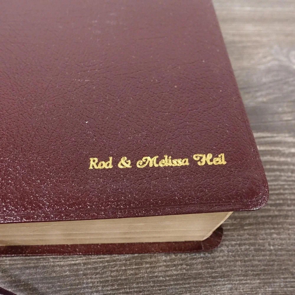 The NIV Study Bible‎ Herald Burgundy Bonded Leather Hardcover Red Letter